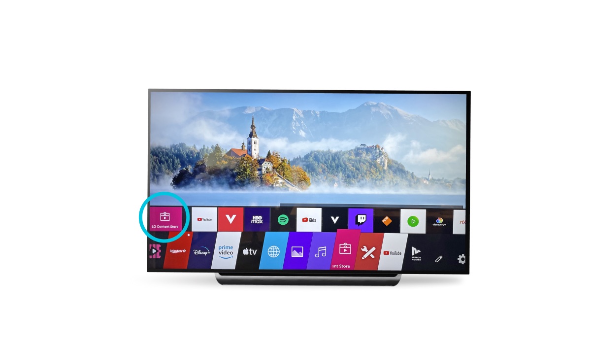 LG TV on white background. The screen shows the menu interface and a background image. The LG Content Store icon is highlighted