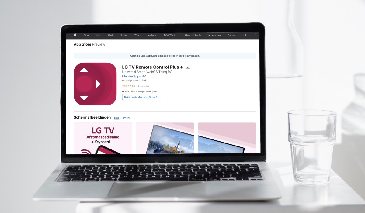 A MacBook with the Mac App Store page for the Lg TV Remote Control Plus app on the screen. There's a glass of water next to the MacBook