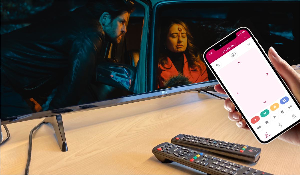 Male detective looking at a dead woman in a car on an LG TV screen. Two LG remotes and a hand holding an iPhone with the LG TV Remote Control Plus app interface on the screen