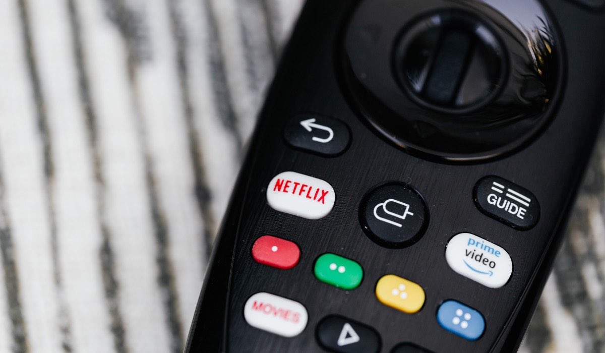 A closeup photo of the Magic Remote by LG. Visible are Netflix button and Prime Video button