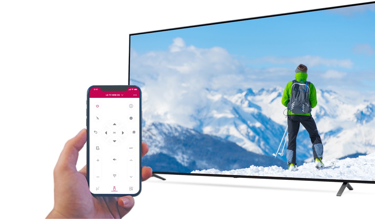 A hand holding an iphone with LG tV remote app, an LG Tv with a man on mountain summit