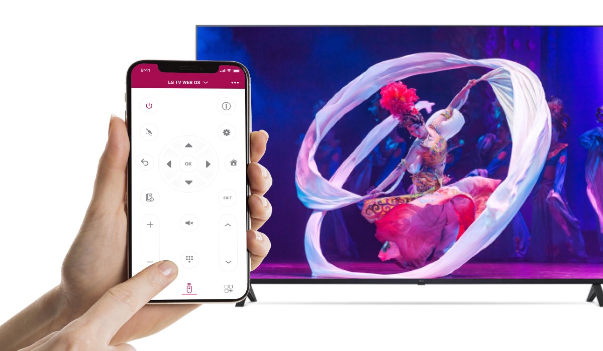 Two hands holding an iPhone with LG TV Remote App on the screen. An LG TV with serpent dancer on the screen