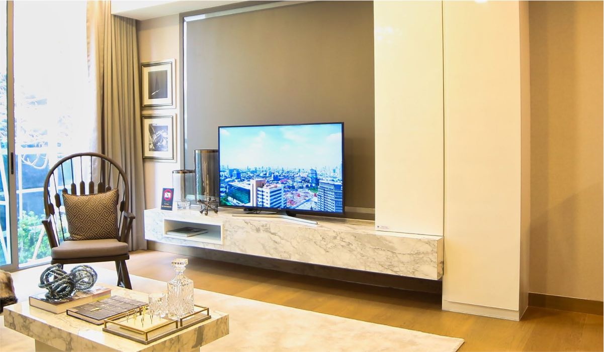 An LG TV in a well-lit living room