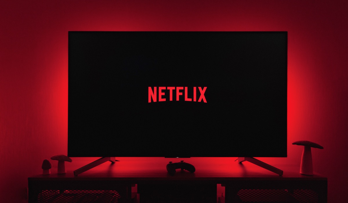 Netflix logo on an LG TV with red backlights