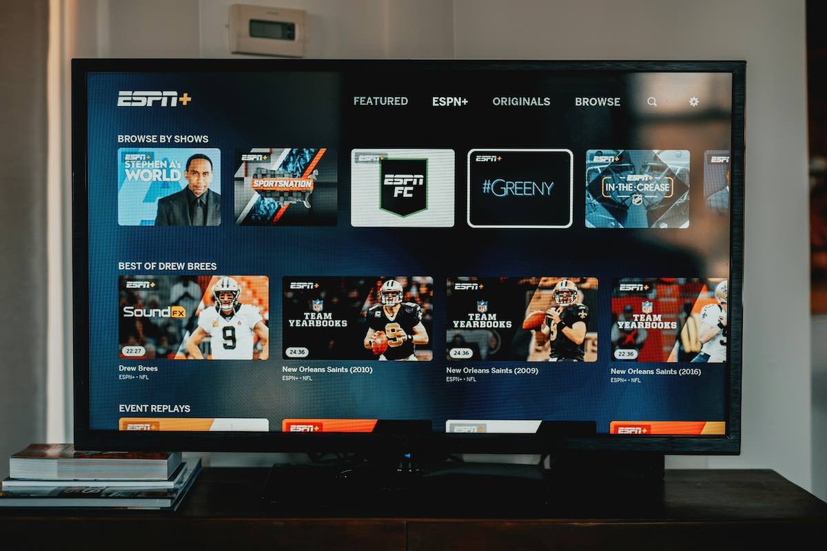 ESPN + App on a TV in a living room